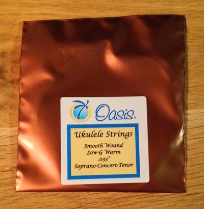 Oasis Carbon Uke Conc/Sop/Ten Warm Low G smooth wound, Single String (4SW)